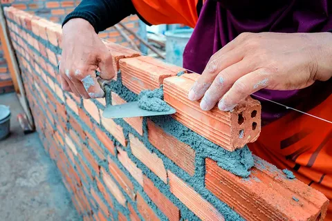 Precise bricklaying work as part of high-quality Alaska Construction Estimating Services for masonry.